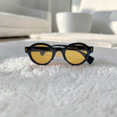 Lunettes rondes noires – verres orange ambré