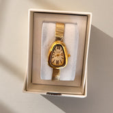 Gold Serpentine – Élégance au Poignet