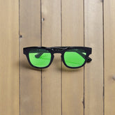 Lunettes noires – Verres verts