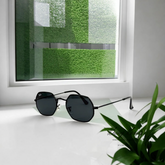 Ray-Ban RB3556N – Lunettes de soleil Octogonales Noir & Verres Foncés