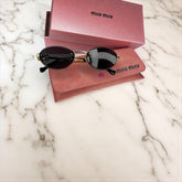 Lunettes de soleil femme – Miu Miu MU10AV Noir & Doré