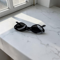 Lunettes Unisexe Noir UV400 – Forme Cat Eye Aiguisée