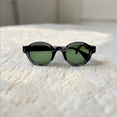 Lunettes rondes gris foncé verres verts