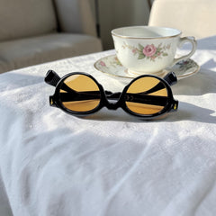 Lunette ronde noire – verres jaune dégradé
