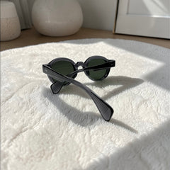Lunettes rondes gris foncé verres verts