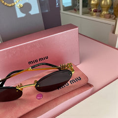 Lunettes de soleil femme – Miu Miu MU10AV Noir & Doré