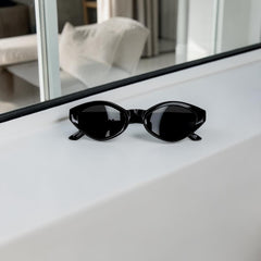 Lunettes Unisexe Noir UV400 – Forme Cat Eye Aiguisée