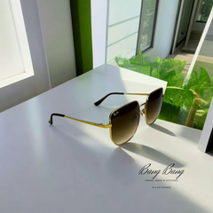 Ray-Ban RB3764D 001/13 – Lunettes de soleil Carrées Doré & Verres Dégradés Marron