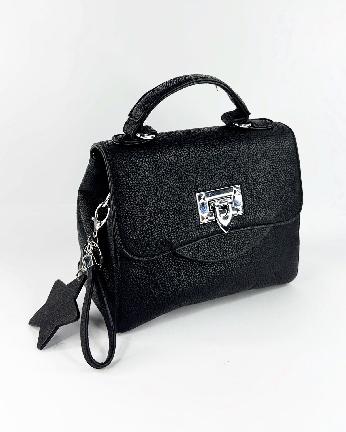 Sac à main noir élégant en cuir texturé avec poignée rigide et fermeture métallique argentée