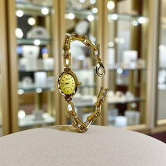 Montre Dorée Femme – Cadran Ovale Or Clair