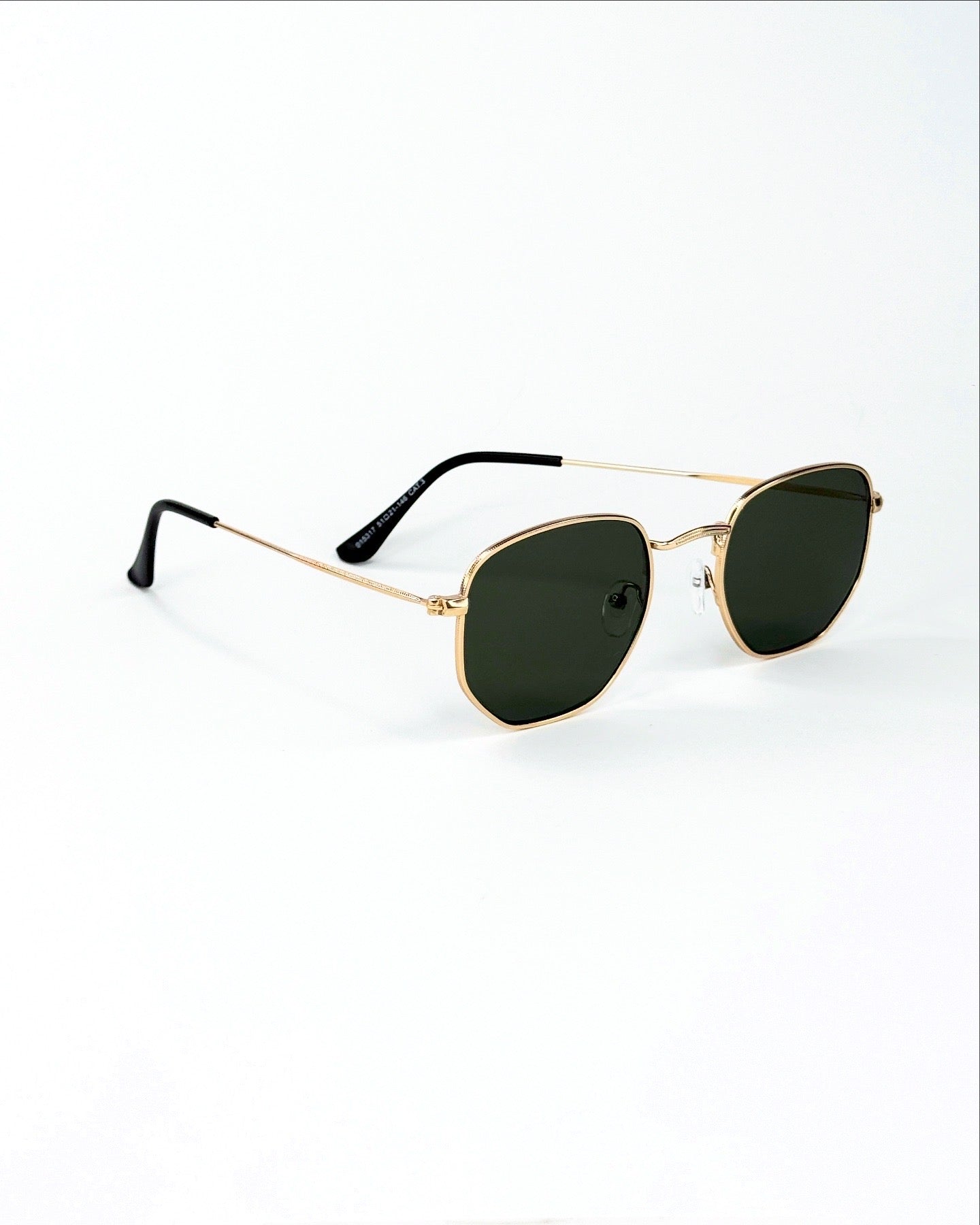 Lunettes de soleil géométriques à monture métallique