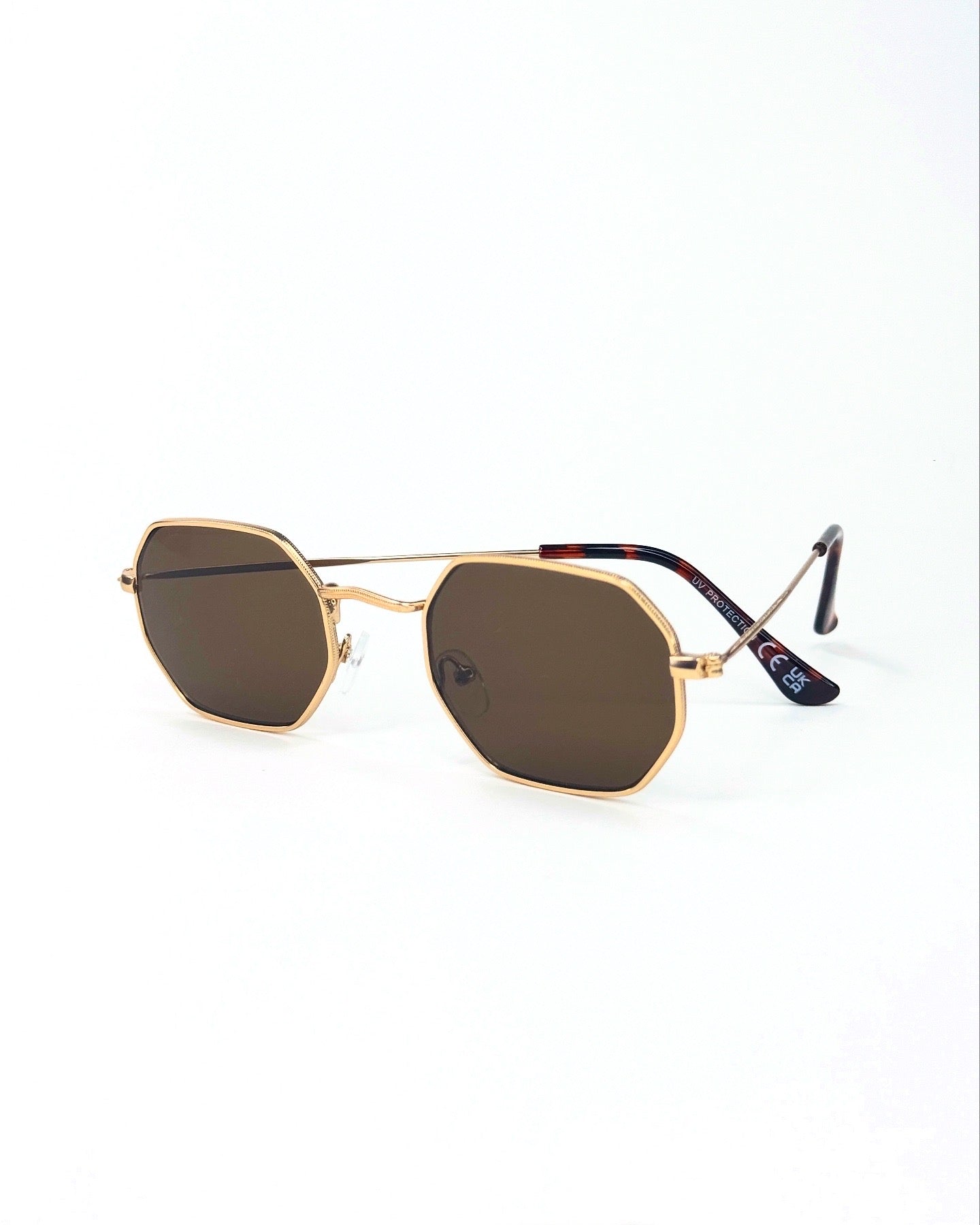 Lunettes de soleil octogonales à monture dorée – Élégance géométrique