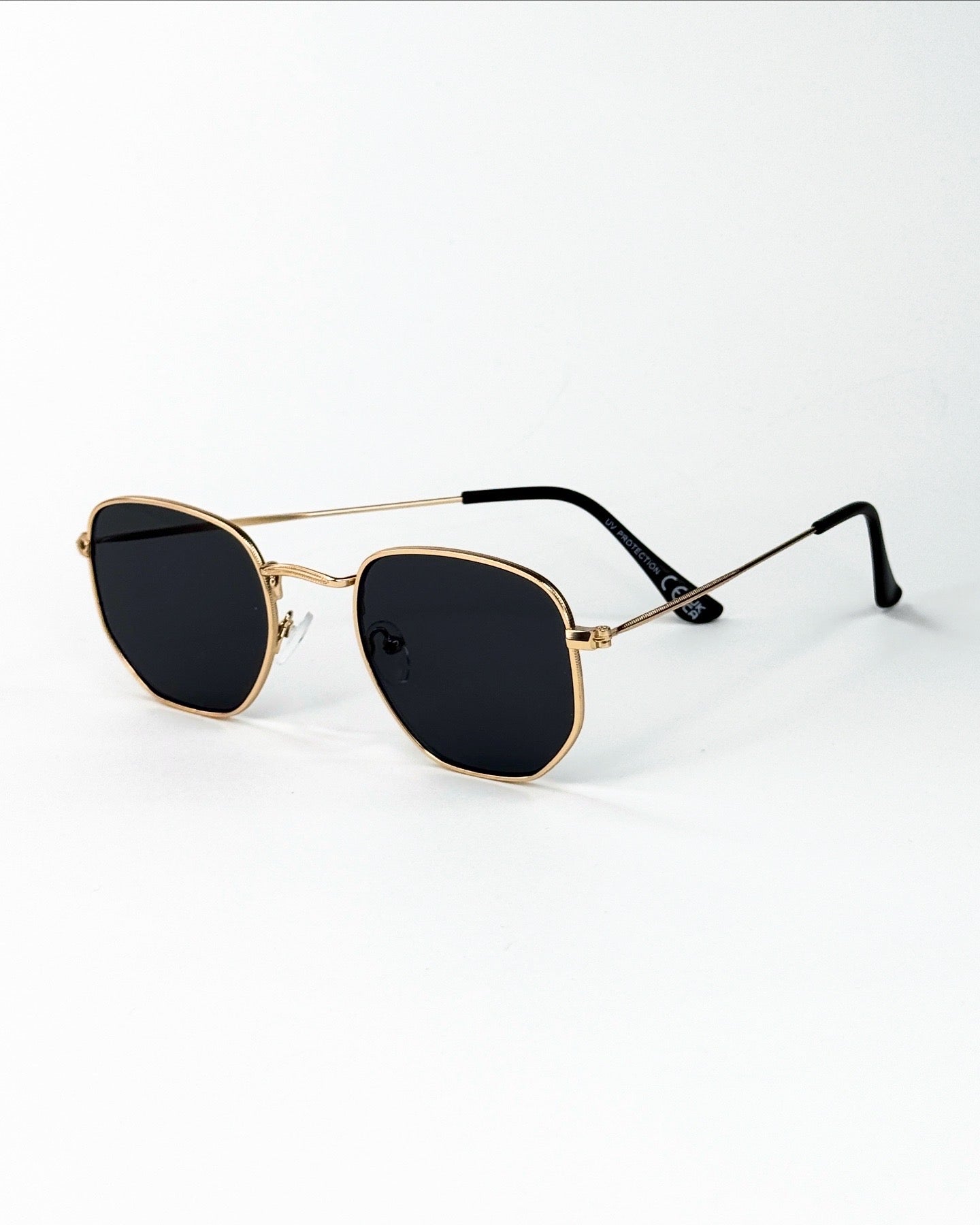 Lunettes de soleil géométriques à monture métallique