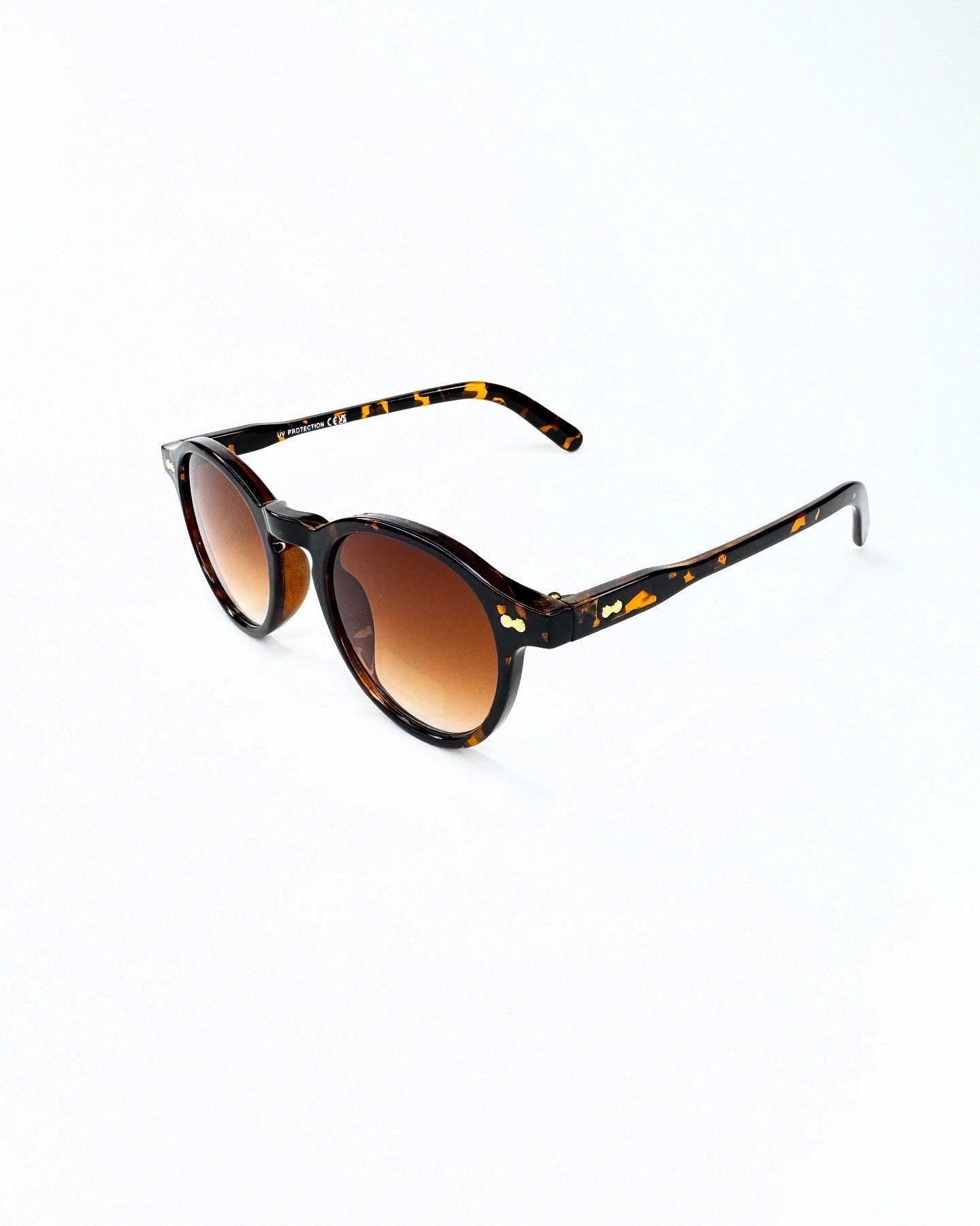 Collection Signature – Lunettes Solaires Rondes Iconiques