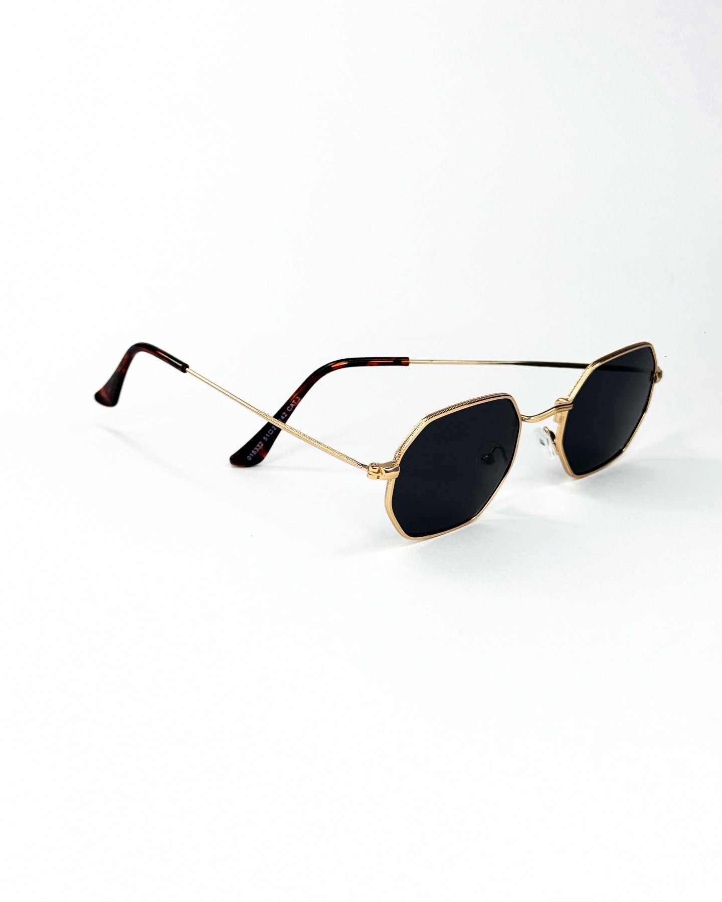 Lunettes de soleil octogonales à monture dorée – Élégance géométrique