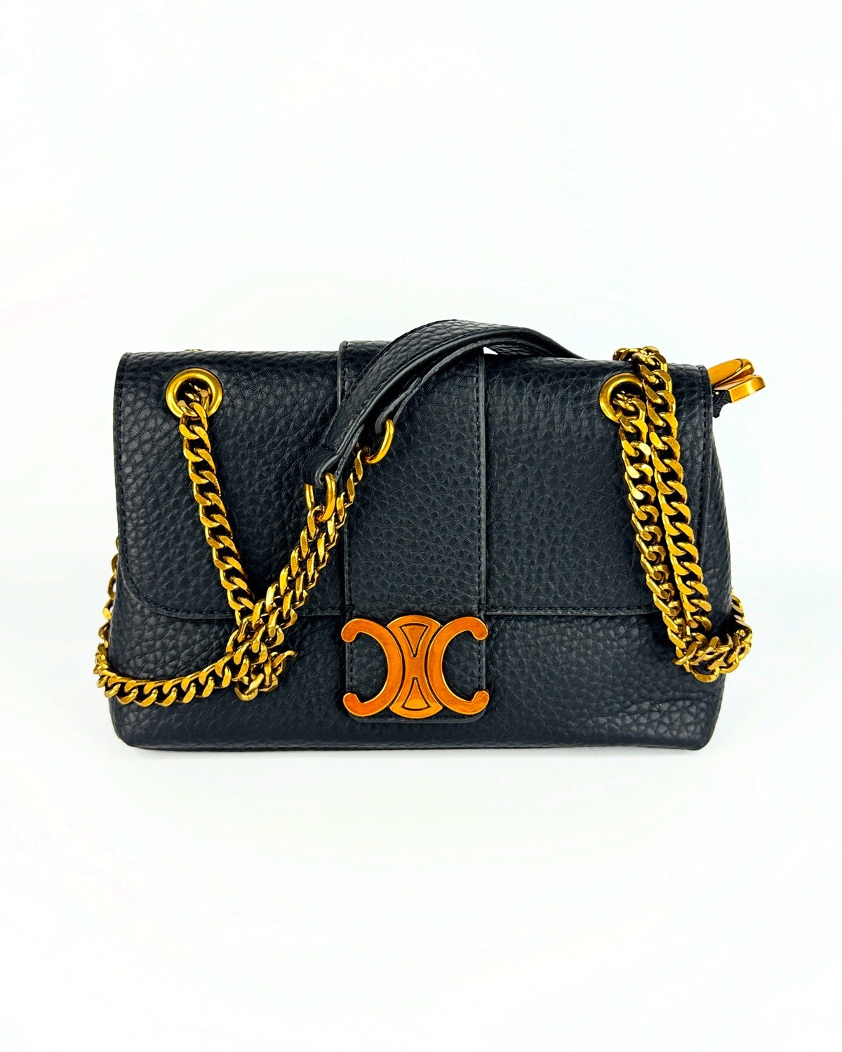 Sac en cuir grainé noir avec chaîne dorée et logo emblématique central